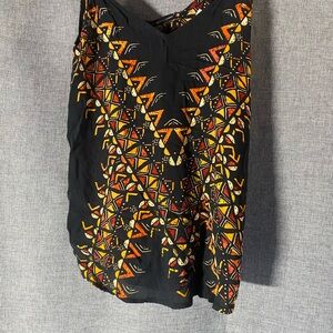 Silence + Noise Black Top with Red and Yellow Geometric Patterns